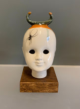 Load image into Gallery viewer, Porcelain doll head steer horn with orange and spider decal
