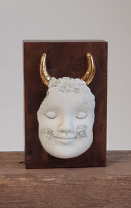 Block head with golden horns