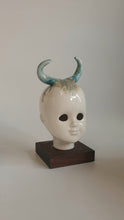 Load image into Gallery viewer, Porcelain doll, blue cow horns and hair texture in browny green
