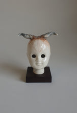 Load image into Gallery viewer, Doll Head, Highland cow girl in orange and grey..
