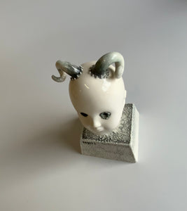 Ram Horn Doll with ceramic base