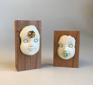 Block Head with green flower
